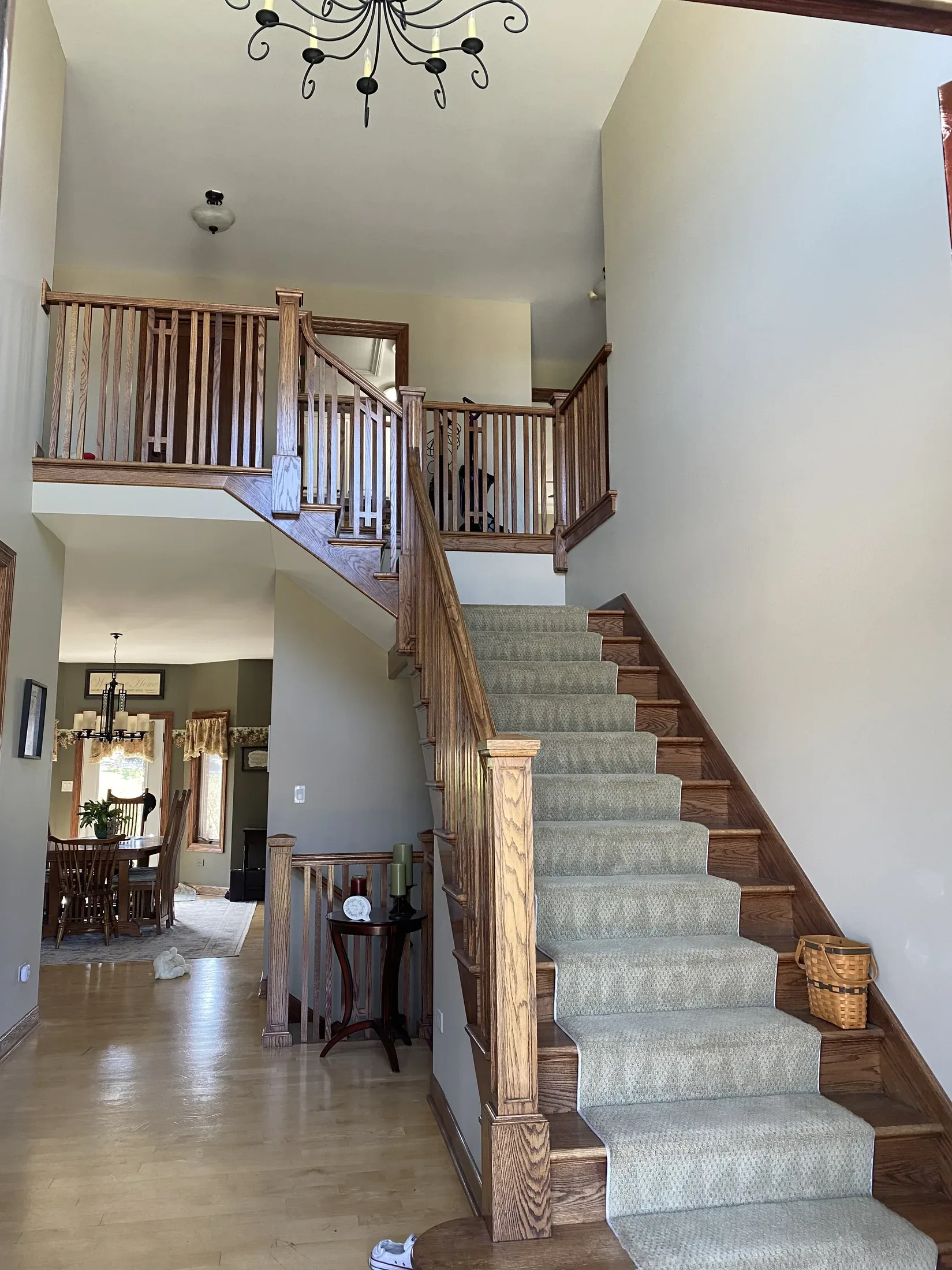Whole-home remodel interior with stone fireplace and furnished living room