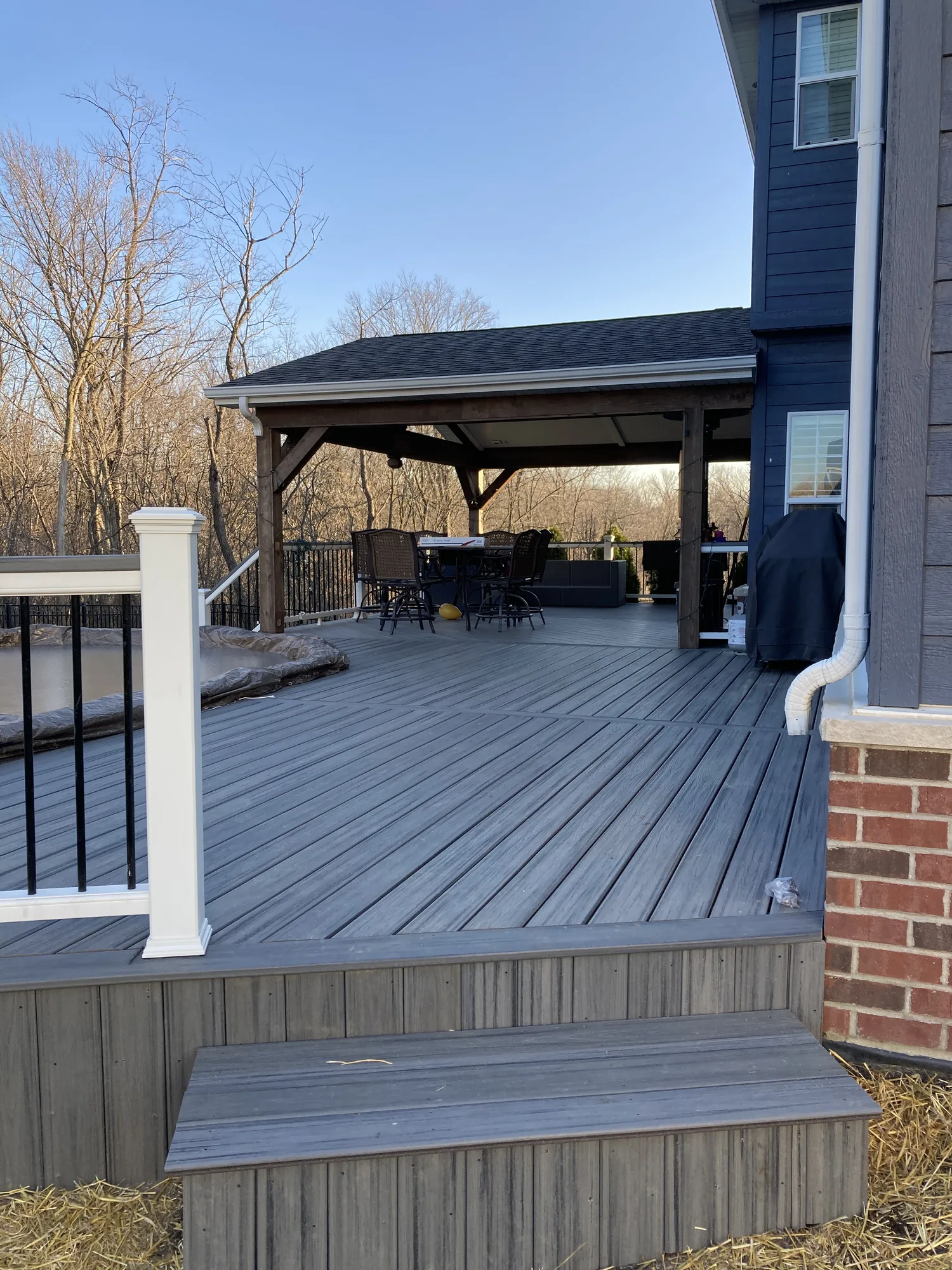 Custom composite deck built by EZ Custom Homes