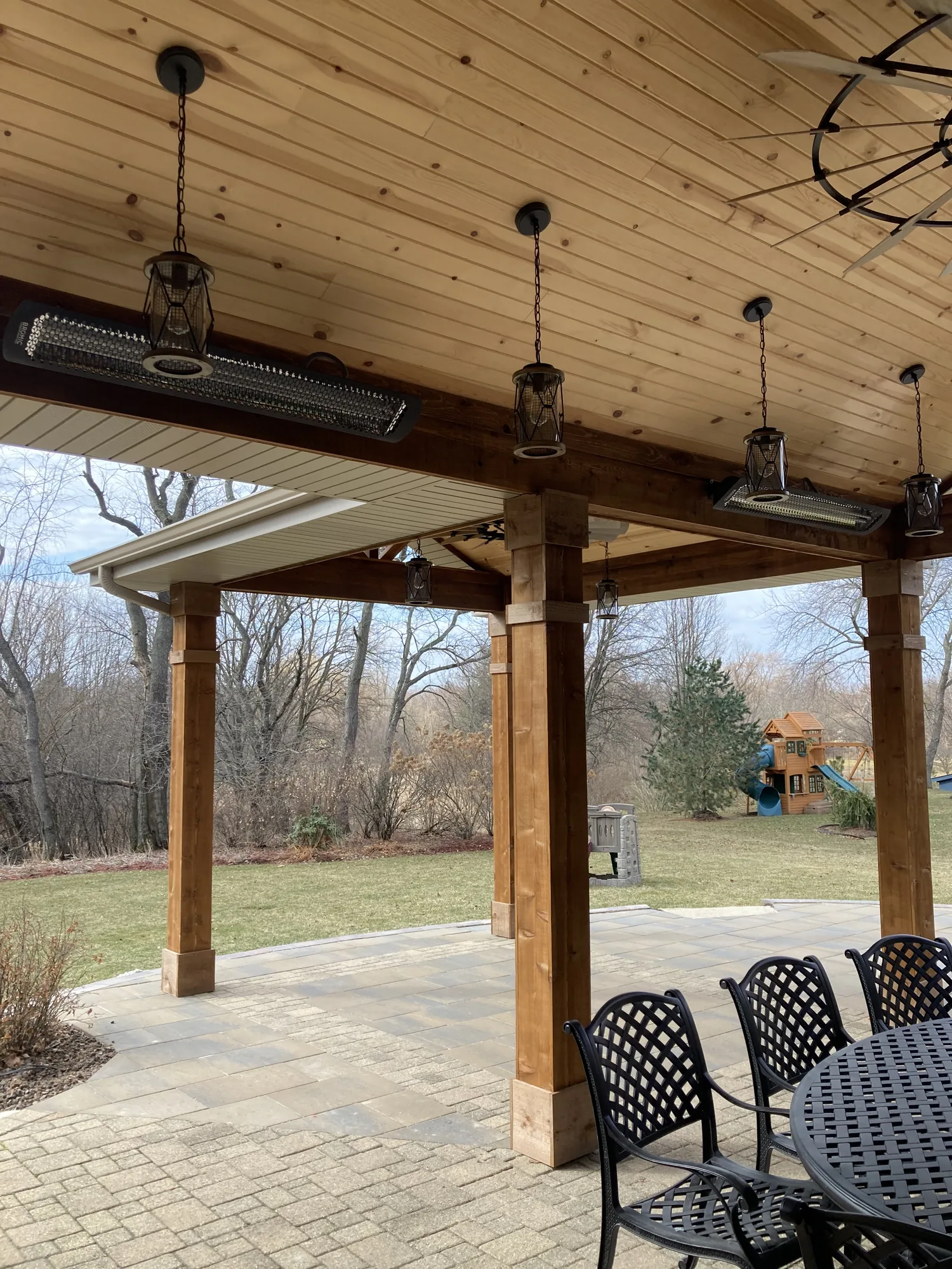 Covered back patio with outdoor living area